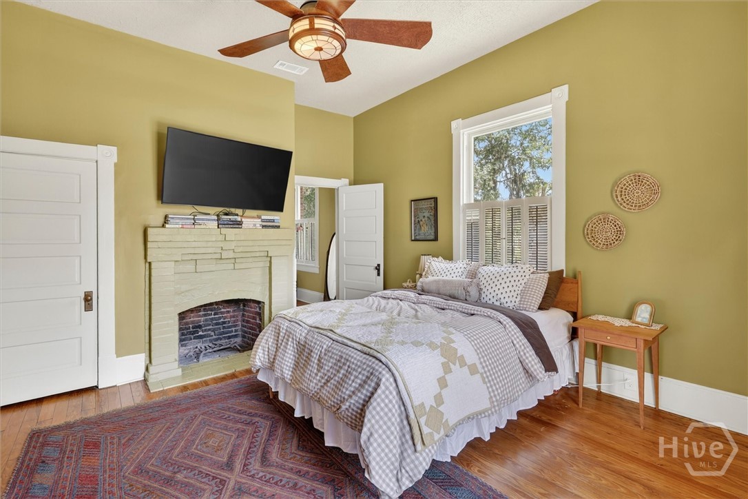Upstairs Bedroom 1 (primary) with large walk-through closet