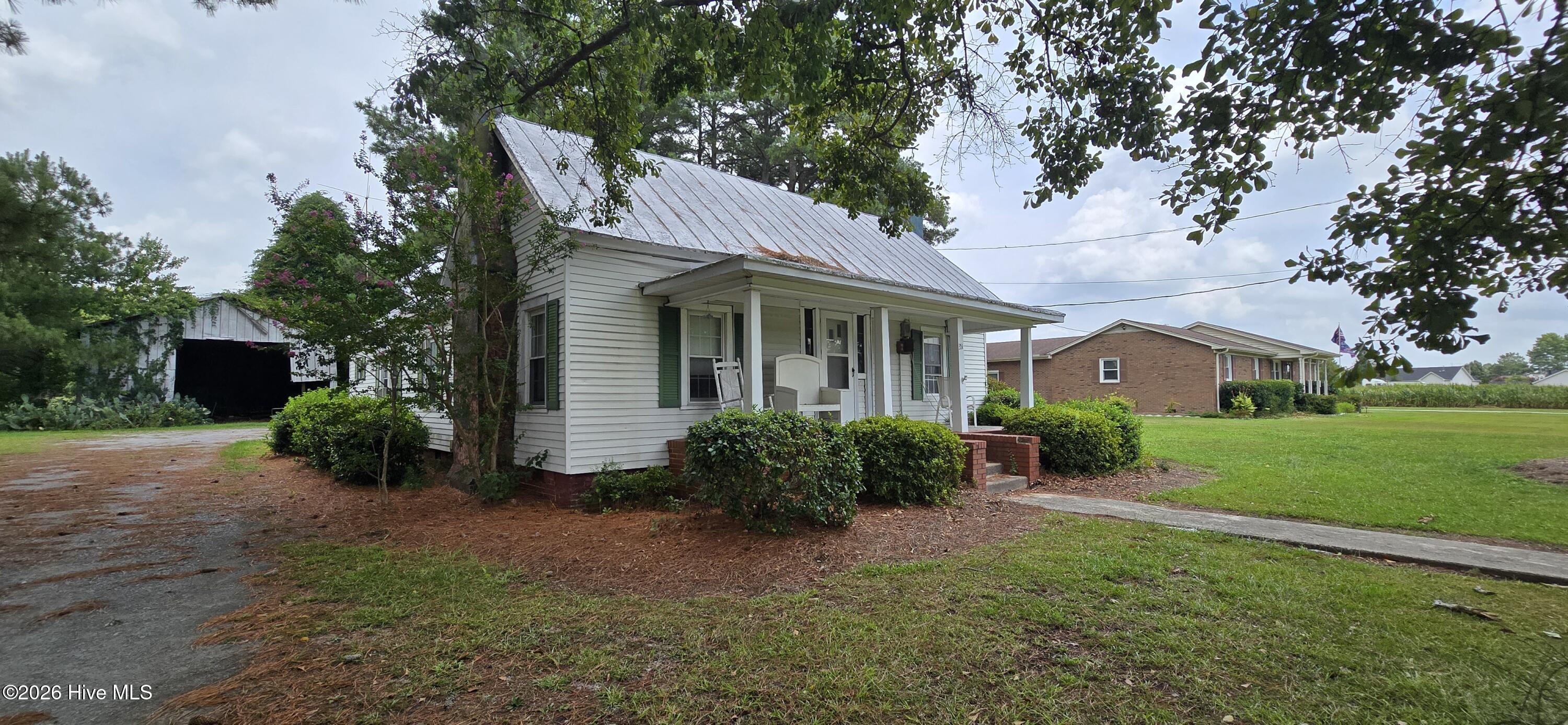 Exterior photo of 351 Vernon White Road, Winterville, NC 28590. MLS: 100590712