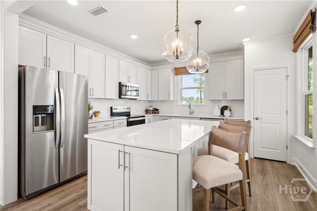 Pictures, photographs, colors, features, and sizes are for illustration purposes only and will vary from the homes as built.