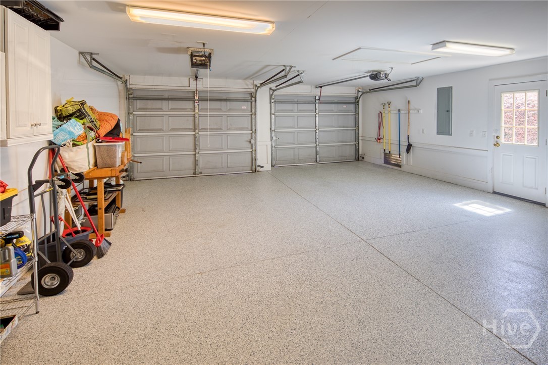 Garage has epoxy flooring , brand new