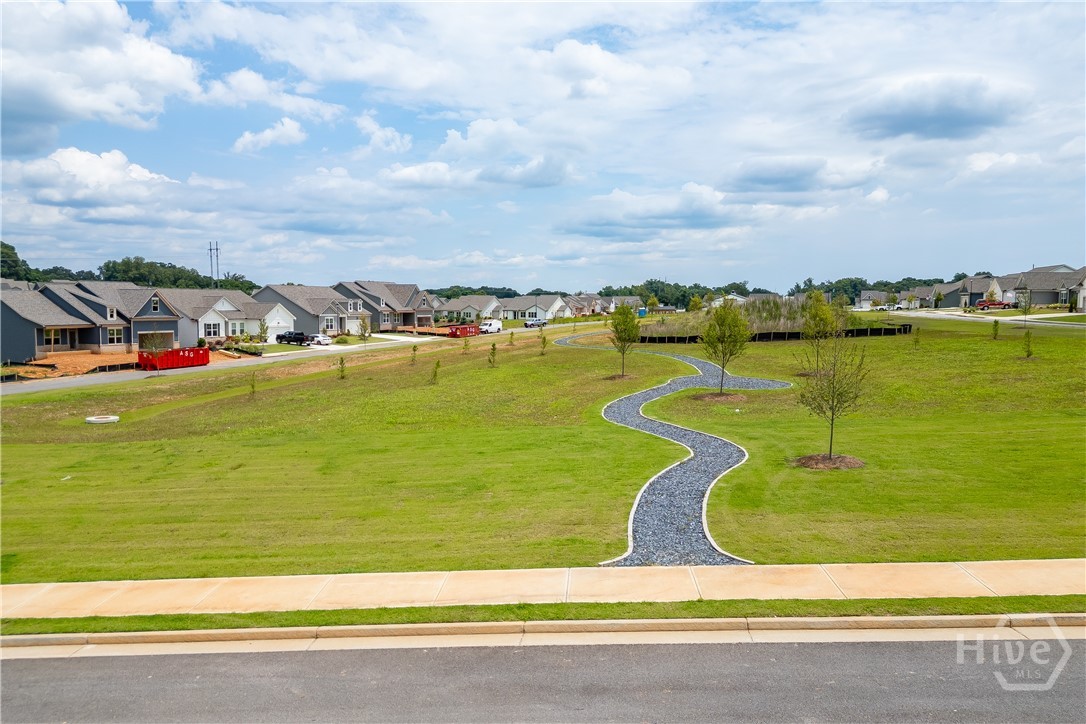 Enjoy the community Green Space from your covered