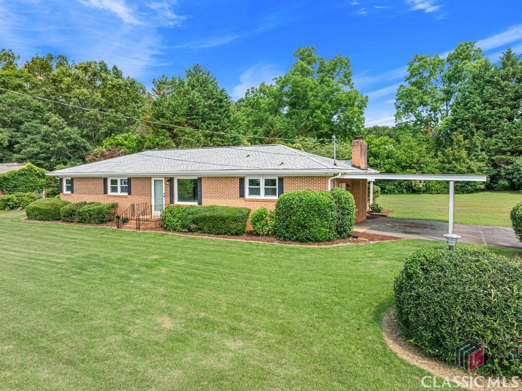 NEWLY PRICED, MOVE IN READY! Beautifully updated brick ranch just minutes from University of Georgia North Campus / Arches. Bright and airy interior features an abundance of natural light and outdoor views combined with neutral color palette provides INVITING and stress free sanctuaries throughout. This open living area provides endless possibilities to PERSONALIZE with to gather and cheer on the Dawgs or RELAX on the covered patio. NO HOA - NO RENTAL RESTRICTIONS. Only 5 miles/10 minutes to the Classic Center, downtown Athens shopping & restaurants.