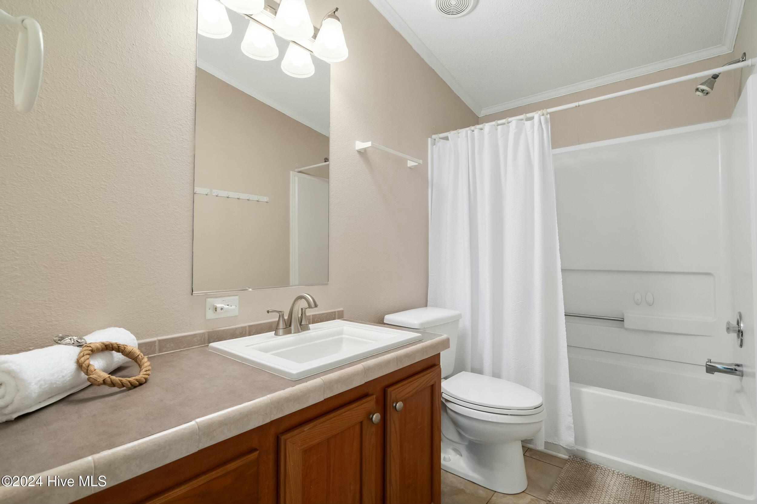 1104 Captains Court, Carolina Shores, NC 28467 – photo 23: Guest Bathroom