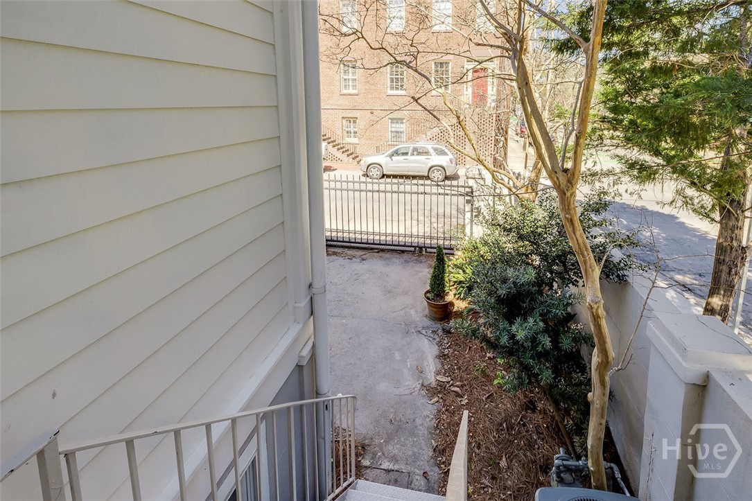 Rear exit to courtyard and parking