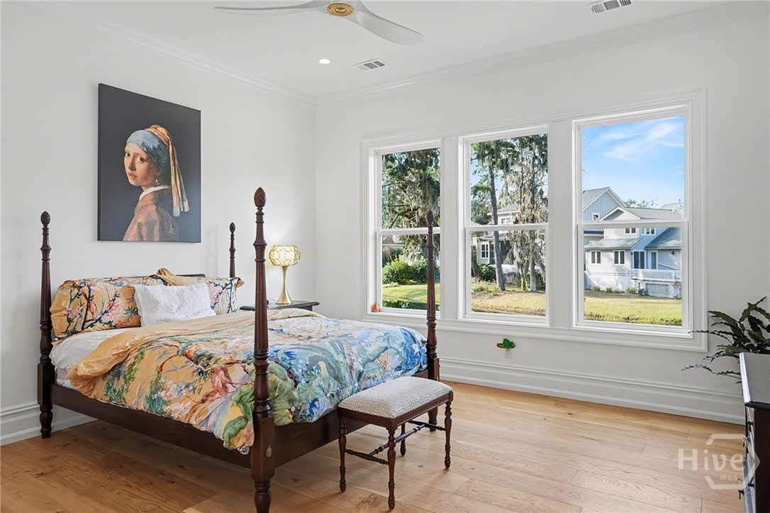 Primary Suite on main level with stunning lagoon views