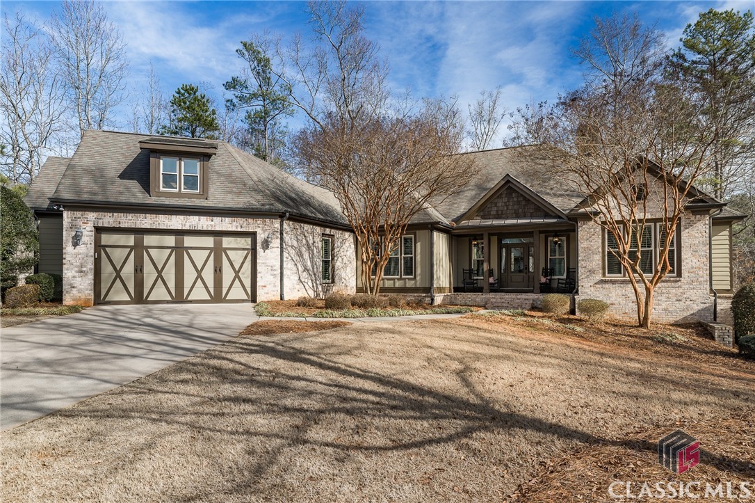 Welcome to this wonderful North Oconee ranch over a basement, offering the ideal blend of comfort and practicality. Upon arrival, you're greeted by an inviting covered front porch that sets the tone for what awaits inside.Inside, the spacious living room, dining room, and kitchen create a well-defined and functional layout, separating the split bedroom floor plan for added privacy. The primary suite on one side of the property boasts a large closet, a double vanity bath, and convenient access to the back porch. This side also accommodates a sizable laundry room and a mudroom off the garage, ensuring both convenience and efficiency.On the other side of the house, you'll find two secondary bedrooms with a full bath, along with a fourth bedroom that can easily double as a beautiful office, offering flexibility to suit your needs.Step outside to the back of the property, where a covered porch featuring a gas fireplace awaits, providing an ideal spot for outdoor relaxation and entertainment.The basement, with its substantial size and ample daylight streaming in from the fenced in backyard, adds an extra layer of potential to this already impressive home. Explore the possibilities and make the most of the space to suit your lifestyle.