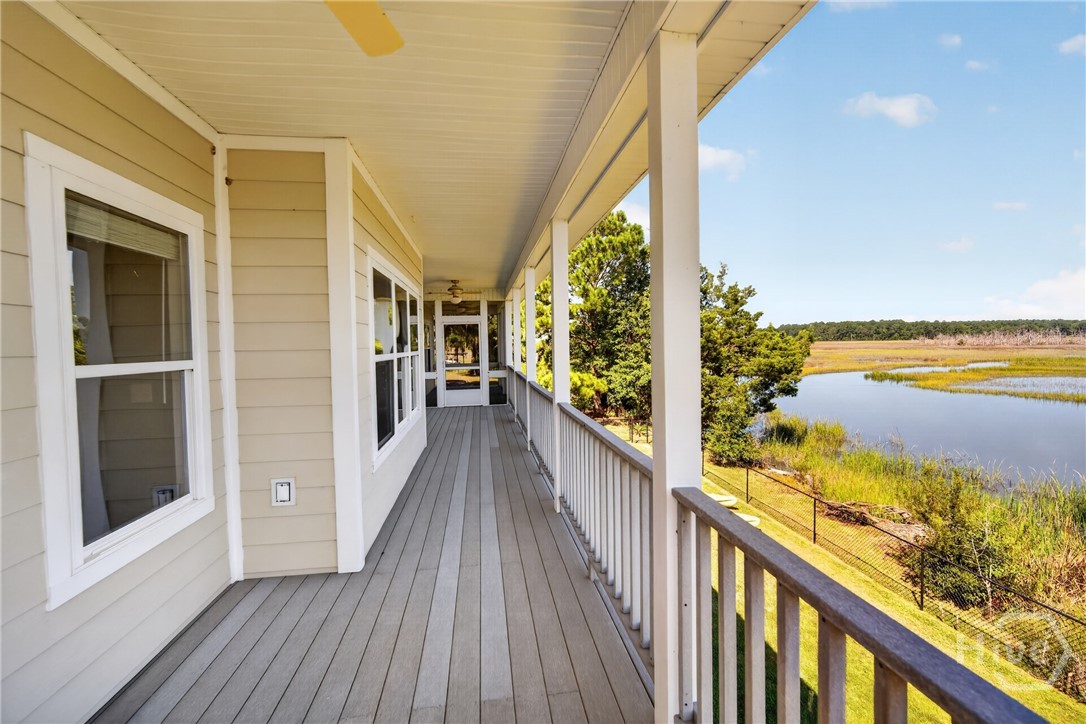 Back deck from master bedroom side looking towards screened in porch.