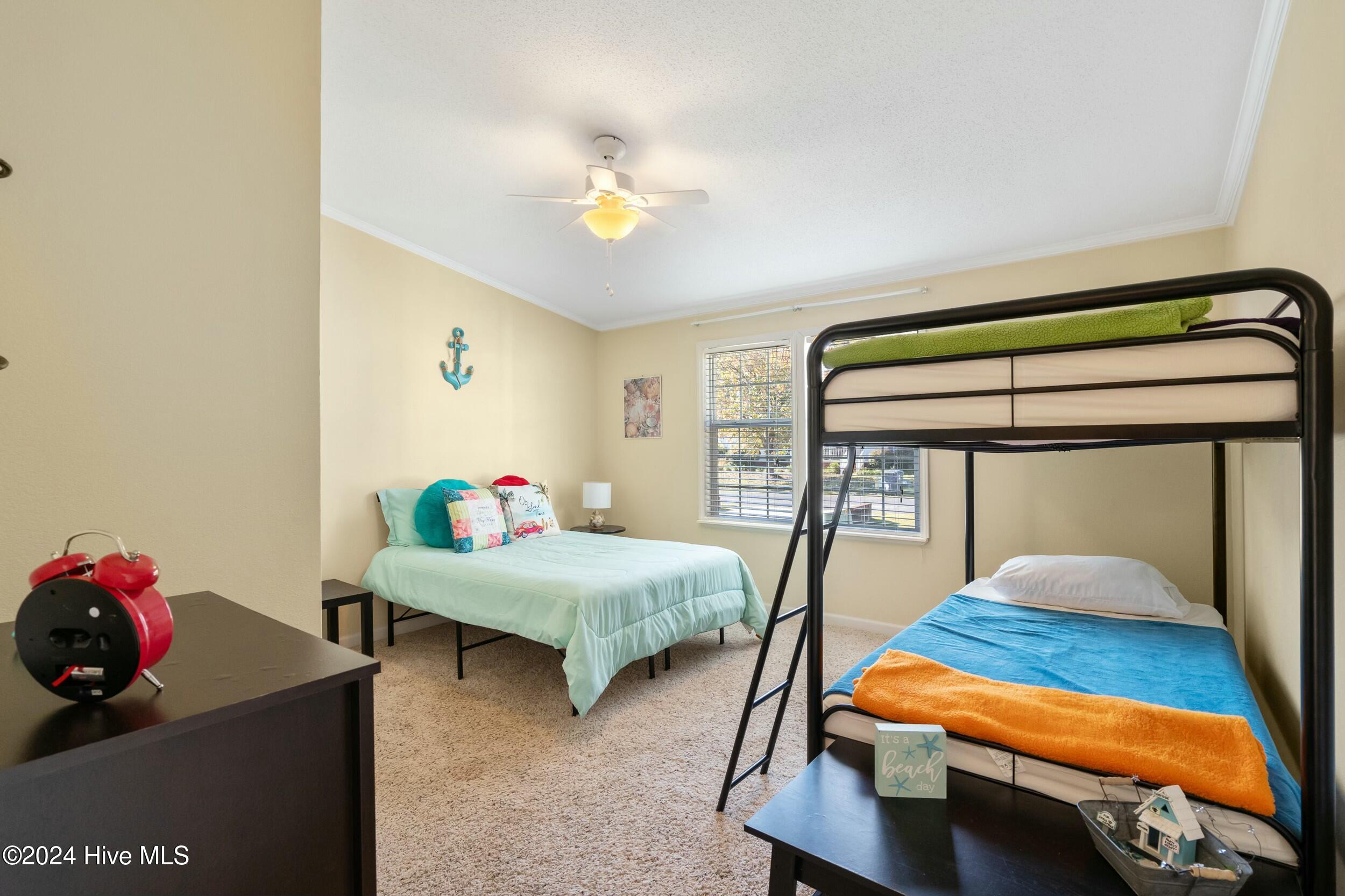 1104 Captains Court, Carolina Shores, NC 28467 – photo 22: Bedroom 3