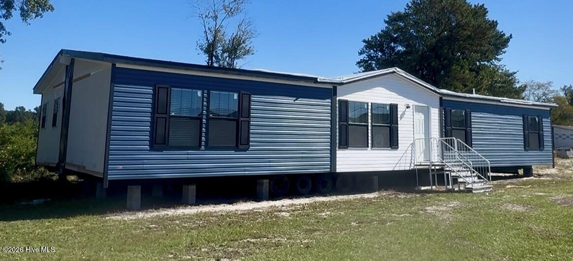 Photo 1 of Manufactured home for sale at 445 Sand Ridge Rd, Pink Hill, NC 28572 | MLS# 100613256 | Listing updated on 2026-10-29