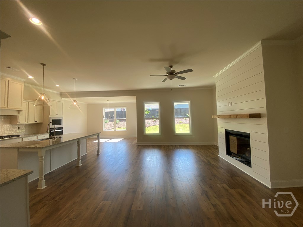 Gas fireplace with ship lap details, a cedar beam