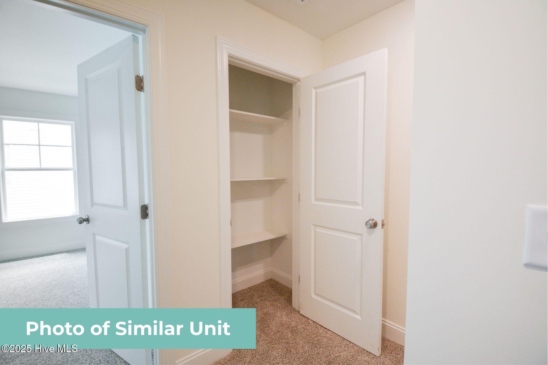 232 Sandy Cove Lane, Sneads Ferry, NC 28460 – photo 14: Second Floor Closet