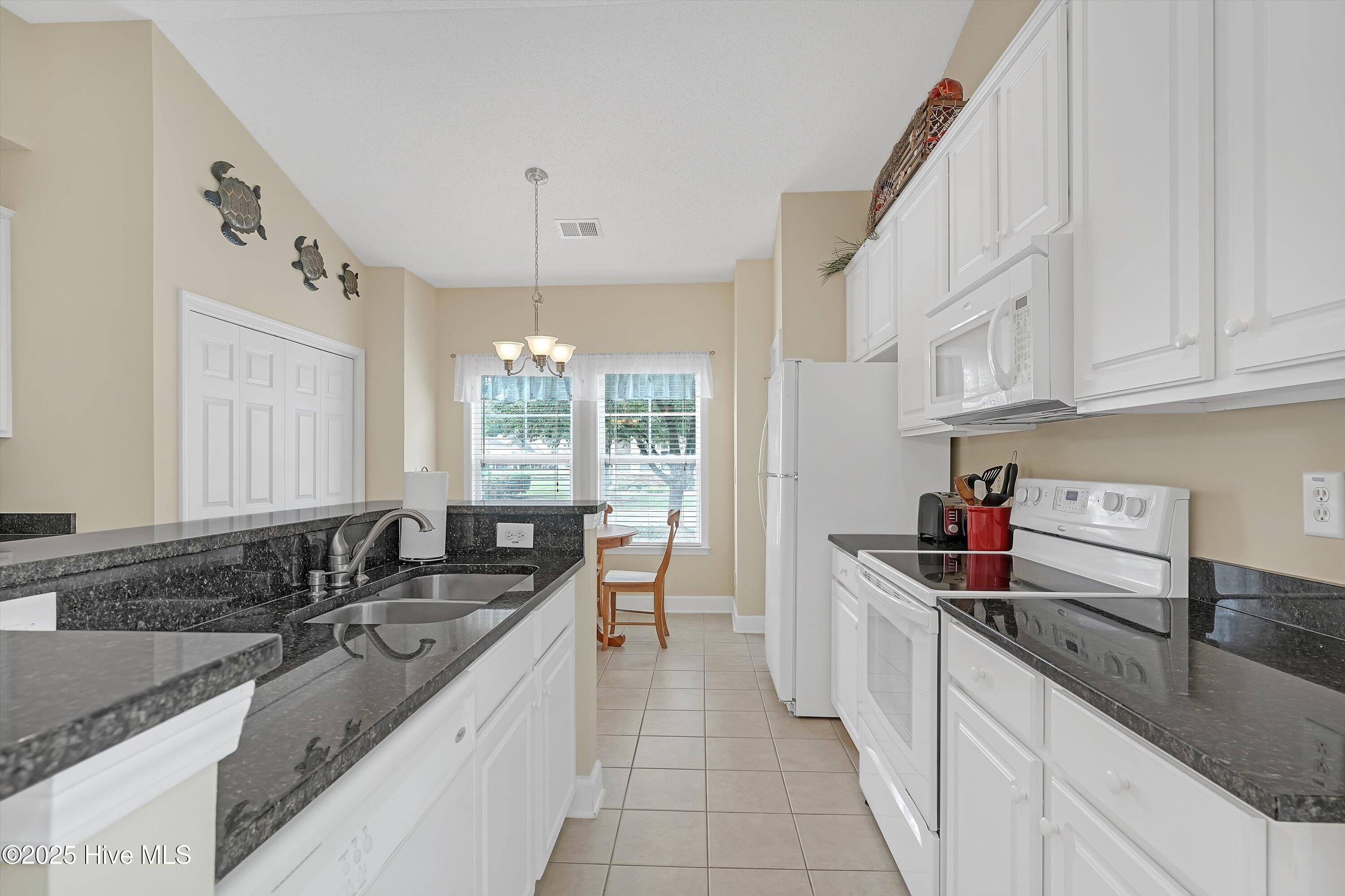 216 Pilothouse Place, Carolina Shores, NC 28467 – photo 11: 11-A7406227