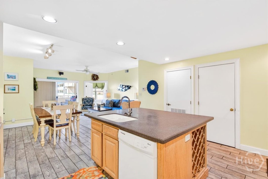 Large central island with wine storage