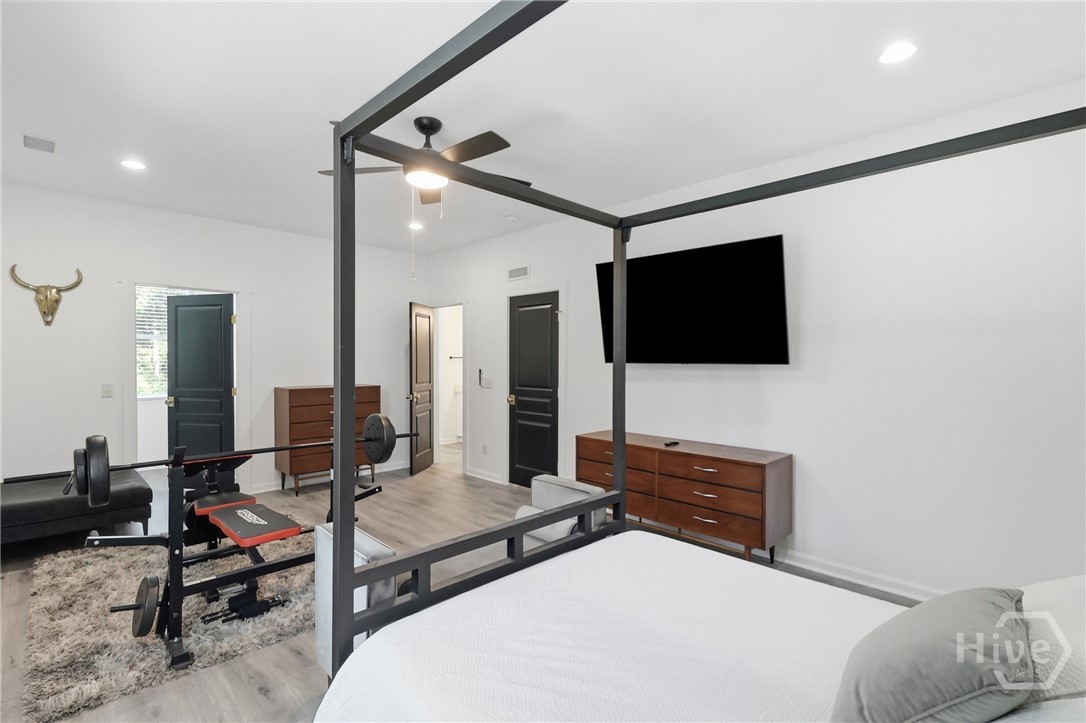 Owner's suite upstairs with exit to exterior, could be used as its own unit.