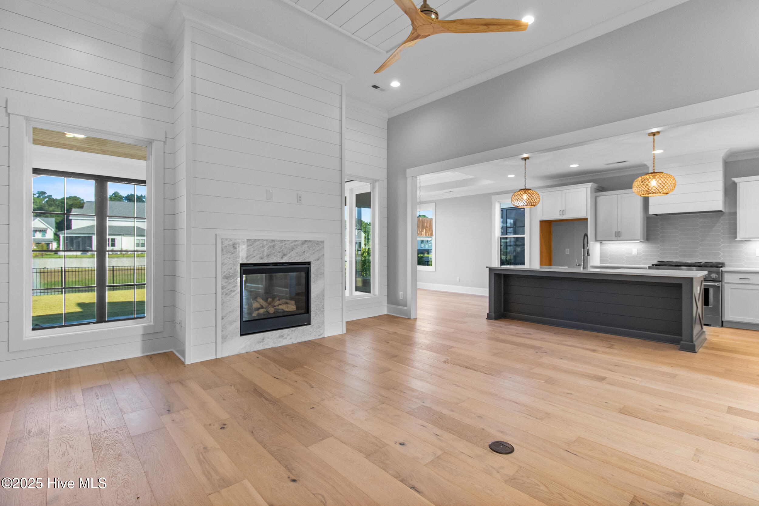 Living room opening to kitchen