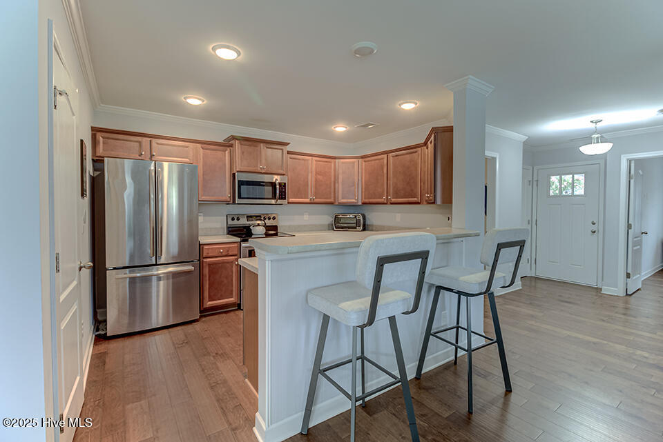 1086 Bridgeport Way, Leland, NC 28451 – photo 6: Entry & Kitchen