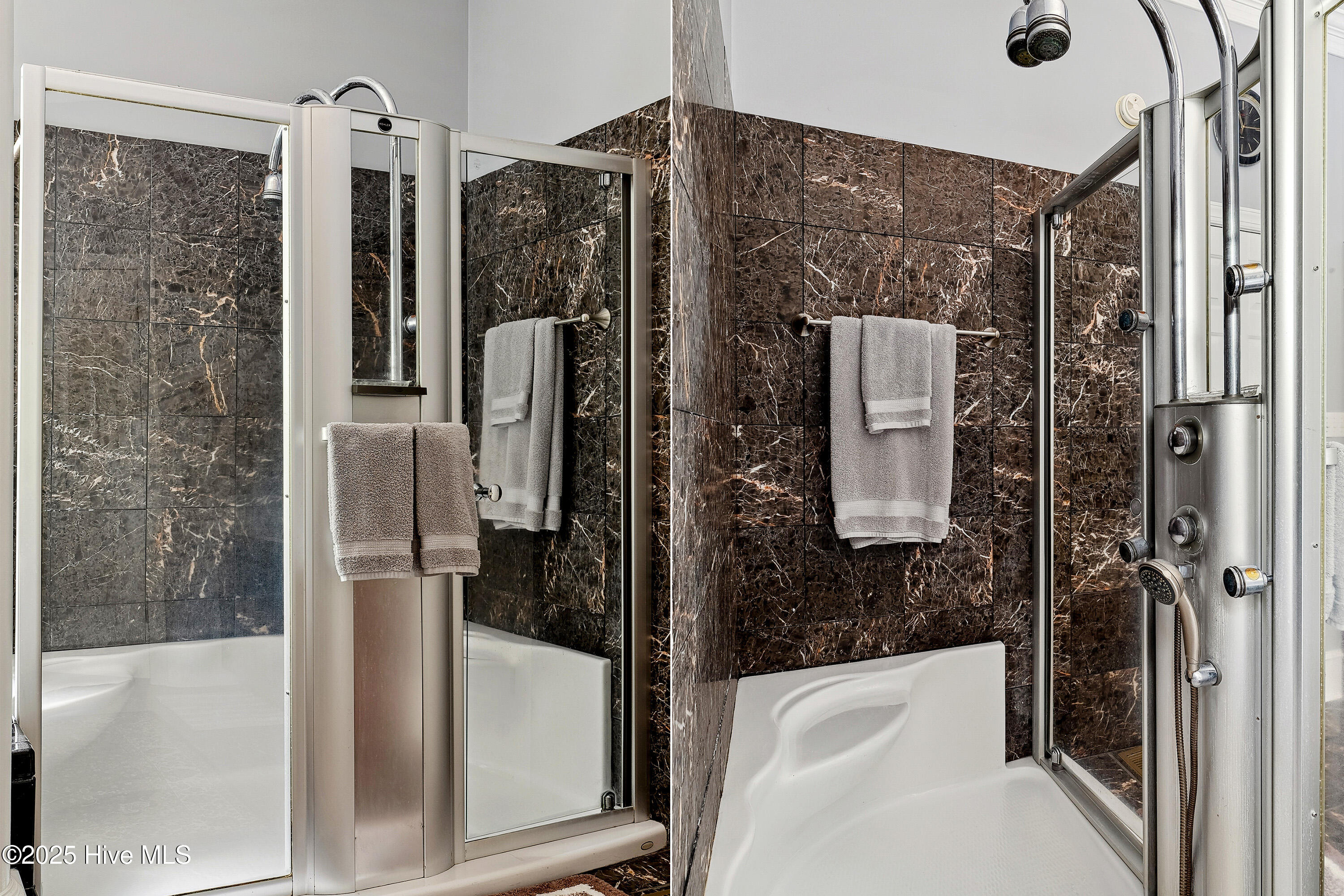 Master shower has numerous shower heads & joins the tub for ease of rinsing after a soak.