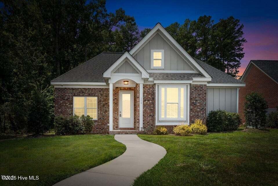 Step into easy one-level living in this 2023 carriage-style home with rear-entry garage and alley access. Spanning 2,067 sq ft, this 3-bedroom, 2-bath beauty blends open living with thoughtful design. The heart of the home is a huge kitchen with QUARTZ counters, prep space, and seamless flow into the breakfast nook and great room. Entertain in style with a formal dining room enhanced by a QUARTZ butler's-style serving/prep area. The screened porch just off the breakfast room makes mornings or evenings a delight. The primary suite is oversized with a spa-like bath featuring a whirlpool tub, large walk-in mosaic shower & spacious closet. A laundry/mudroom drop zone sits just off the garage for everyday convenience. The charming front entrance with winding walk welcomes guests in style. Living here means more than just a home—it's a lifestyle. Residents enjoy indoor and outdoor saltwater pools (heated indoor for year-round use), a full workout facility with locker rooms and showers, a billiards room, and beautifully appointed gathering spaces for hosting events and celebrations. Comfort, convenience, and community come together at Ladybank.