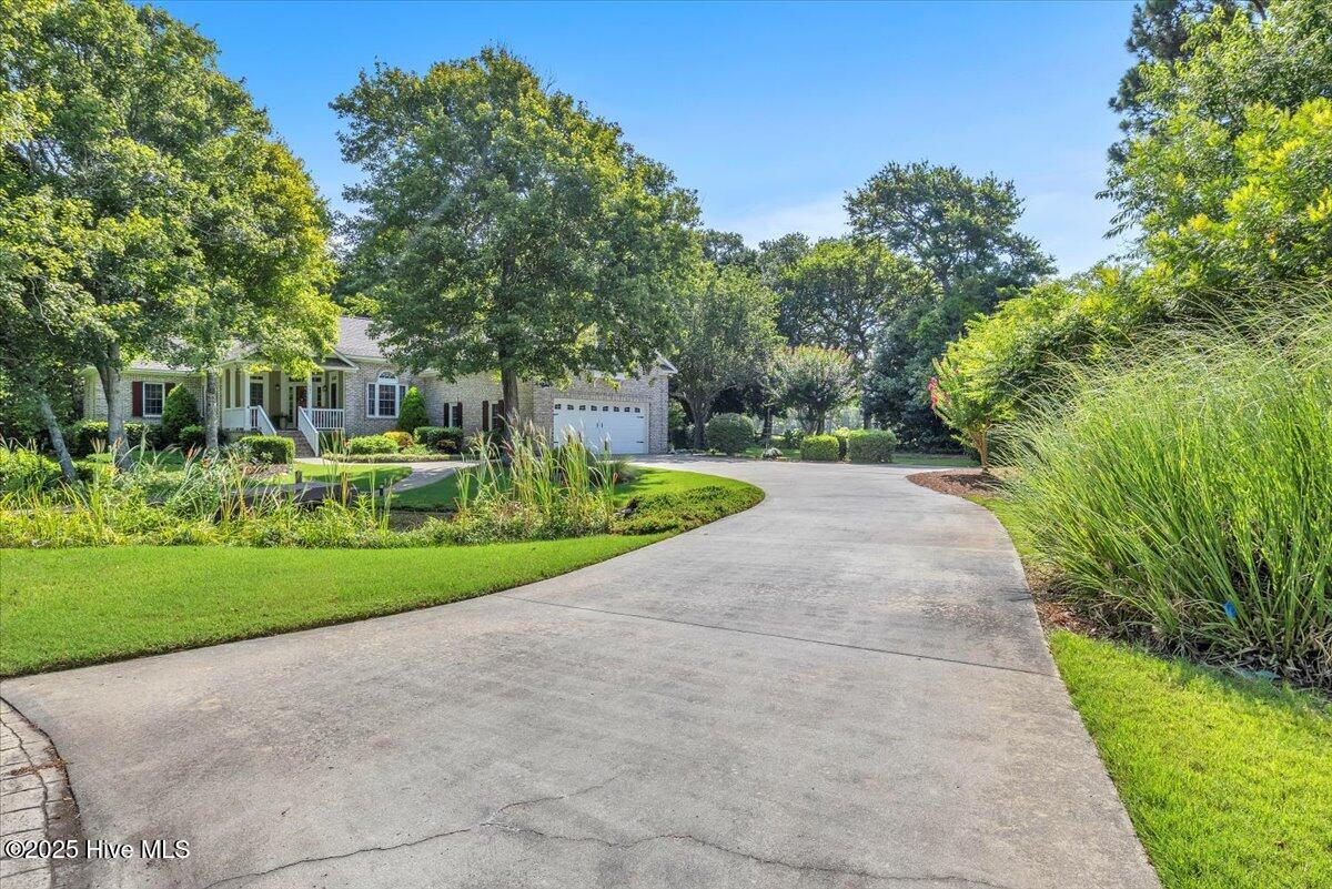 301 Wisteria Way, Caswell Beach, NC 28465 – photo 2: 03-Final 301 Wisteria Way Caswell Beach-