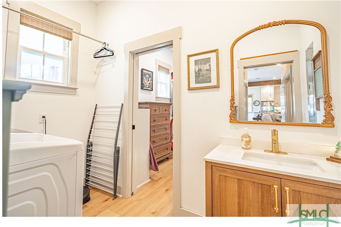 Laundry and Vanity Connected to Owners Closet 1st