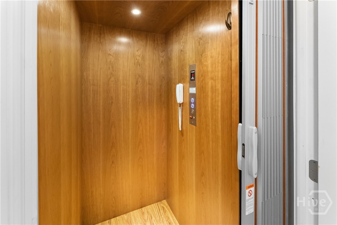 Elevator with wood grain paneling