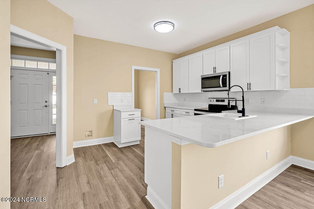 5104 Boss Court SE, Southport, NC 28461 – photo 12: 5104BossCourtSoutheast-11