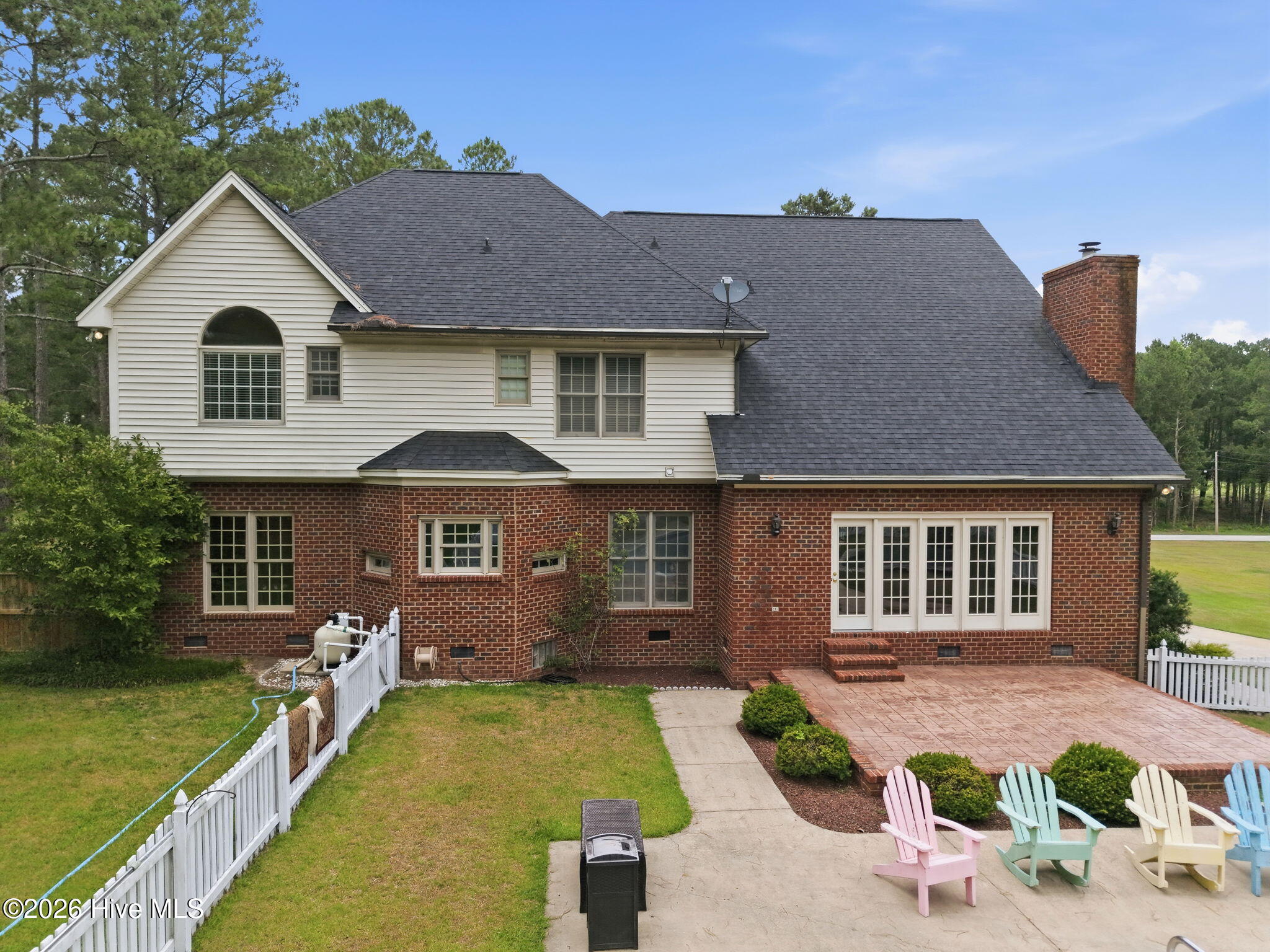 back of home , pool - fenced in ,