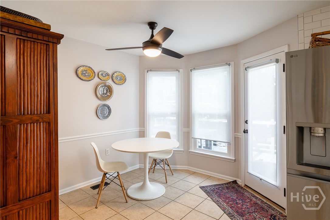 Breakfast area in kitchen with door to deck