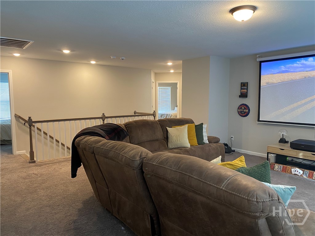Upstairs loft, open modern spindle stair railings