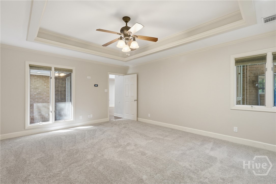 Primary suite is located at the back of the house ensuring peace and quiet.