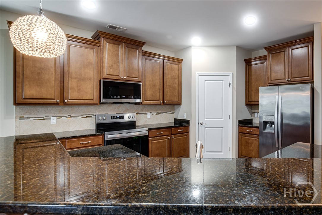 Granite Counters and stainless steel appliances