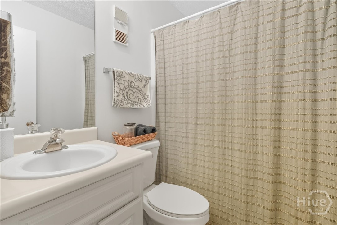 Second full bath with a shower over tub.