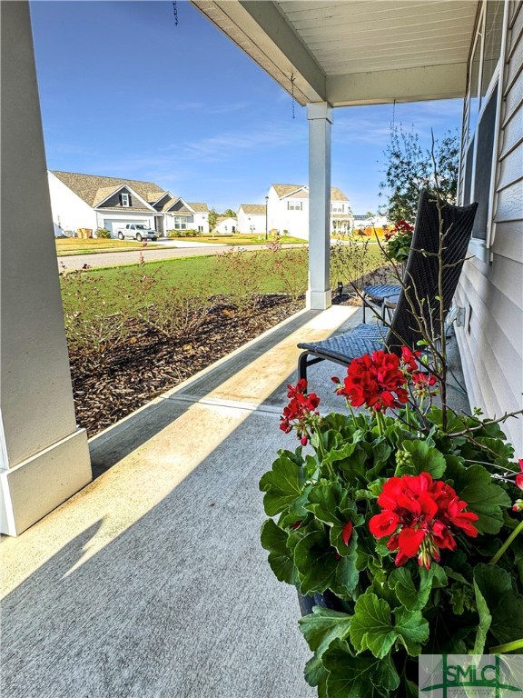 Front Porch has great view of front, expansive yar