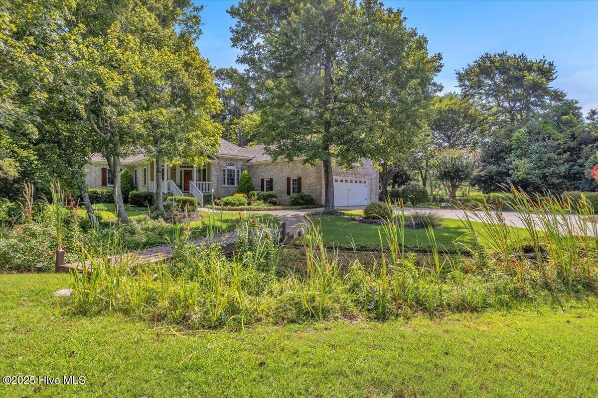 301 Wisteria Way, Caswell Beach, NC 28465 – photo 6: 58-Final 301 Wisteria Way Caswell Beach-