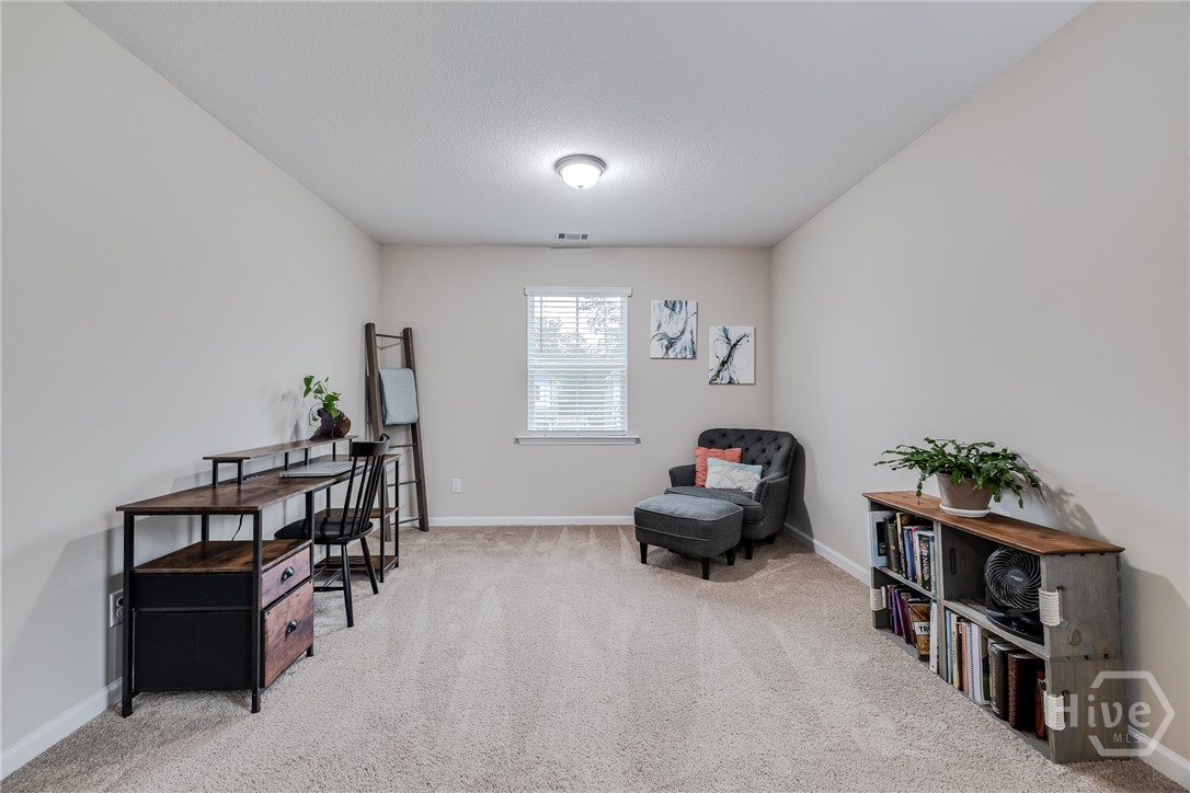 Primary bedroom sitting area
