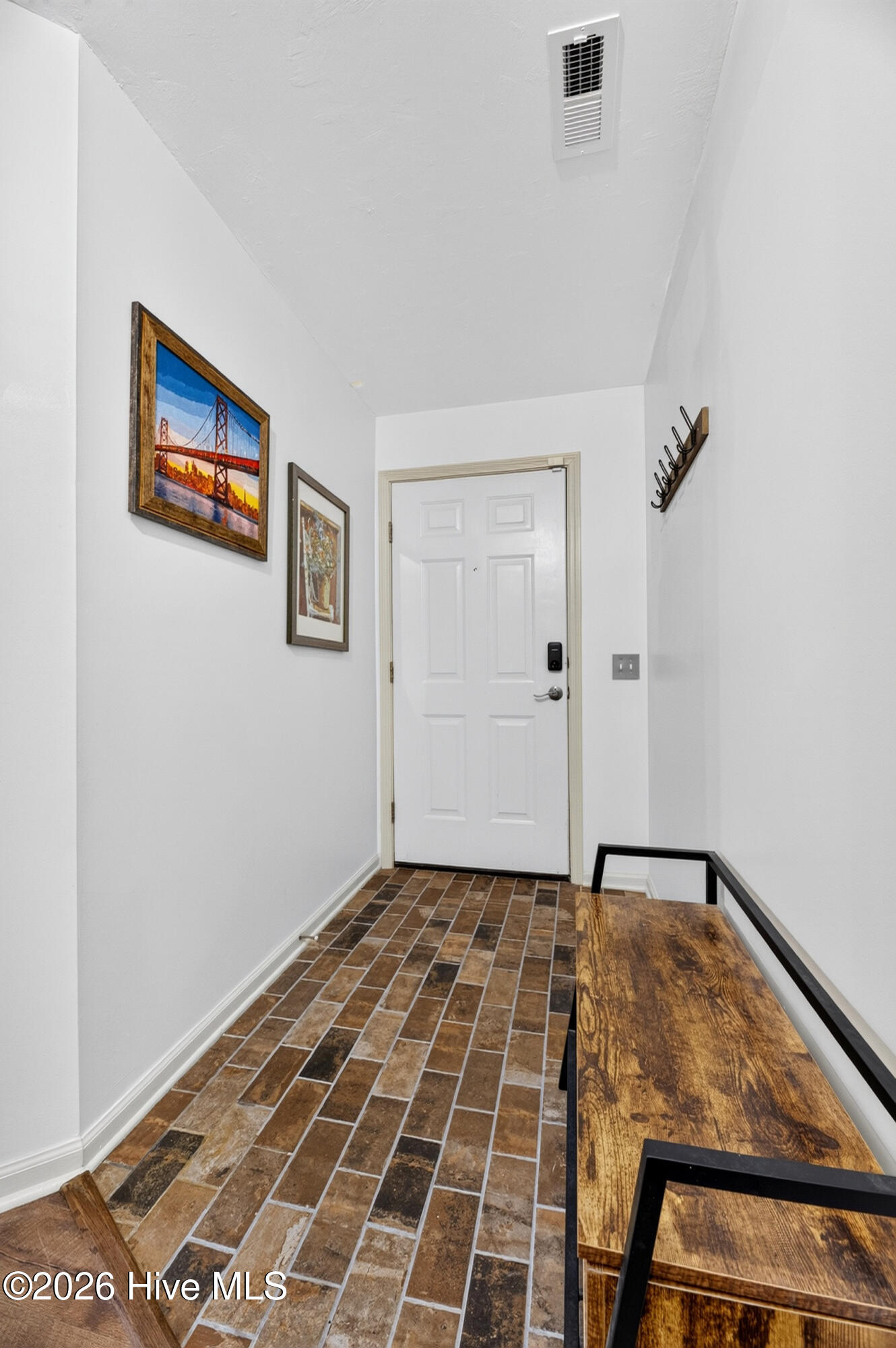 Foyer catches coats, shoes and bookbags