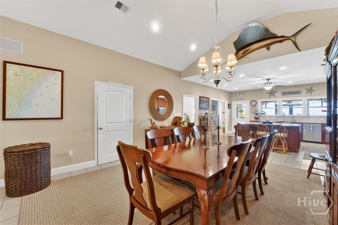Dining area. Door to the left is a hidden bar