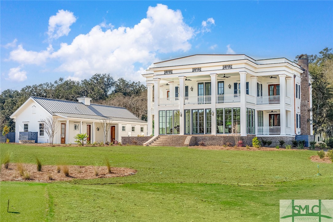 170 Cherry Laurel Way Richmond Hill, Georgia Cherry Hill House: where history meets modern elegance. Originating in 1734 with the Sterling Brothers purchase of the land and flourishing under Henry and Clara Ford, this circa 1870 estate embodies timeless prestige. With 4,215 sf of interiors and 2,022 sf of porches, it blends past charm with today's luxuries, as it is currently undergoing a very thoughtful and meticulous renovation. Views showcase lush greens overlooking Lake Clara and the pristine Ford Field and River Club golf course. Inside, discover four suites, a luminous office, a gourmet kitchen with premium finishes, a scullery, and a separate owner’s entrance. The upper porch transforms into a starry sanctuary, with breathtaking views, complemented by a bespoke beverage nook. While new, the 1,184 sf 4-bay conditioned dogtrot garage is a blend of heritage and function. Construction completed February 15, 2024.
Owning the Cherry Hill House is embracing an American Legacy.