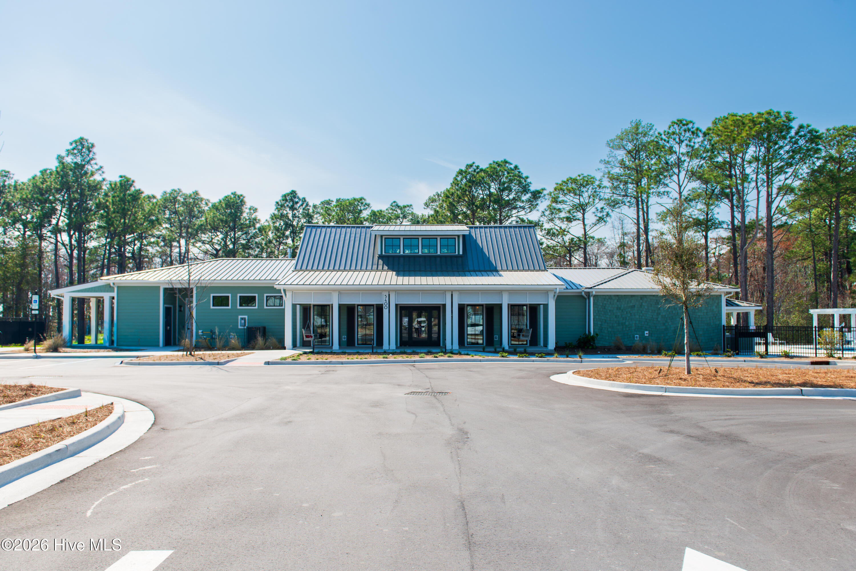Riverhouse Amenity Center featuring pickleball courts.