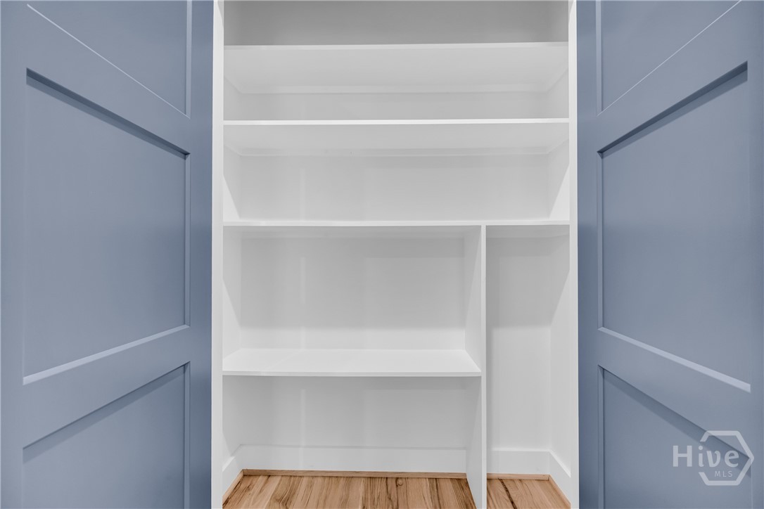 Hall Linen Closet with Vacuum Storage space