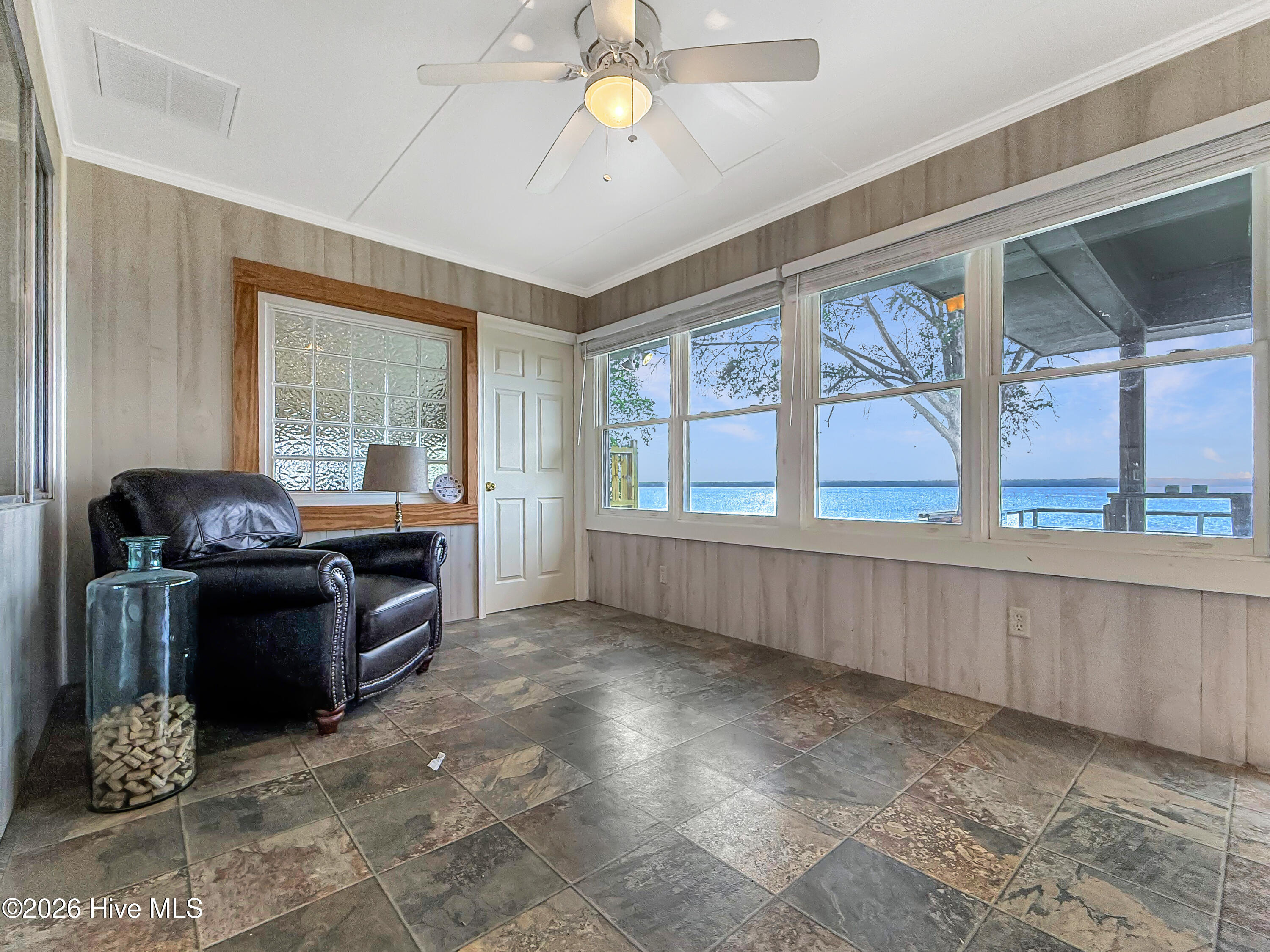 Enjoy a cozy spot in this perfect room taking in the amazing views of the Chowan River