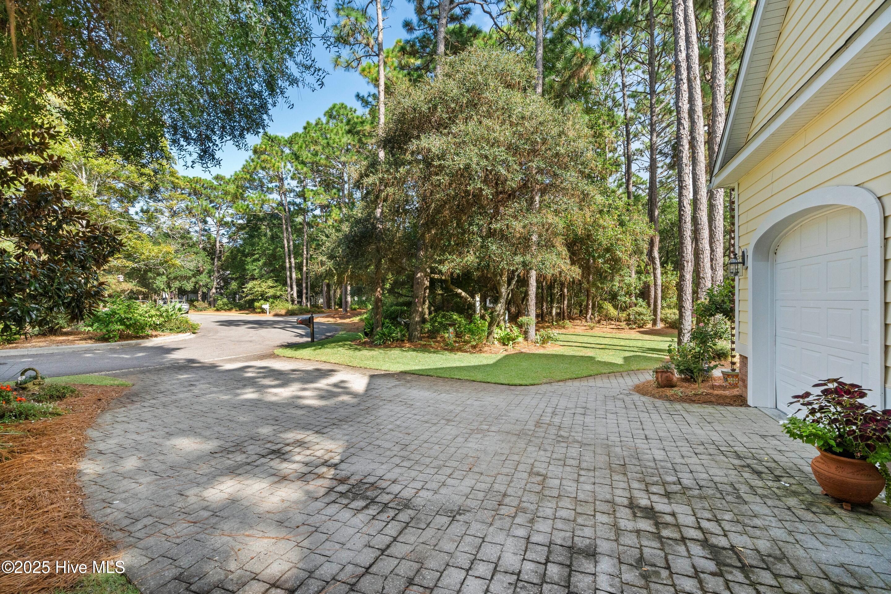 501 Periwinkle Way, Caswell Beach, NC 28465 – photo 18: mls-DSC02184