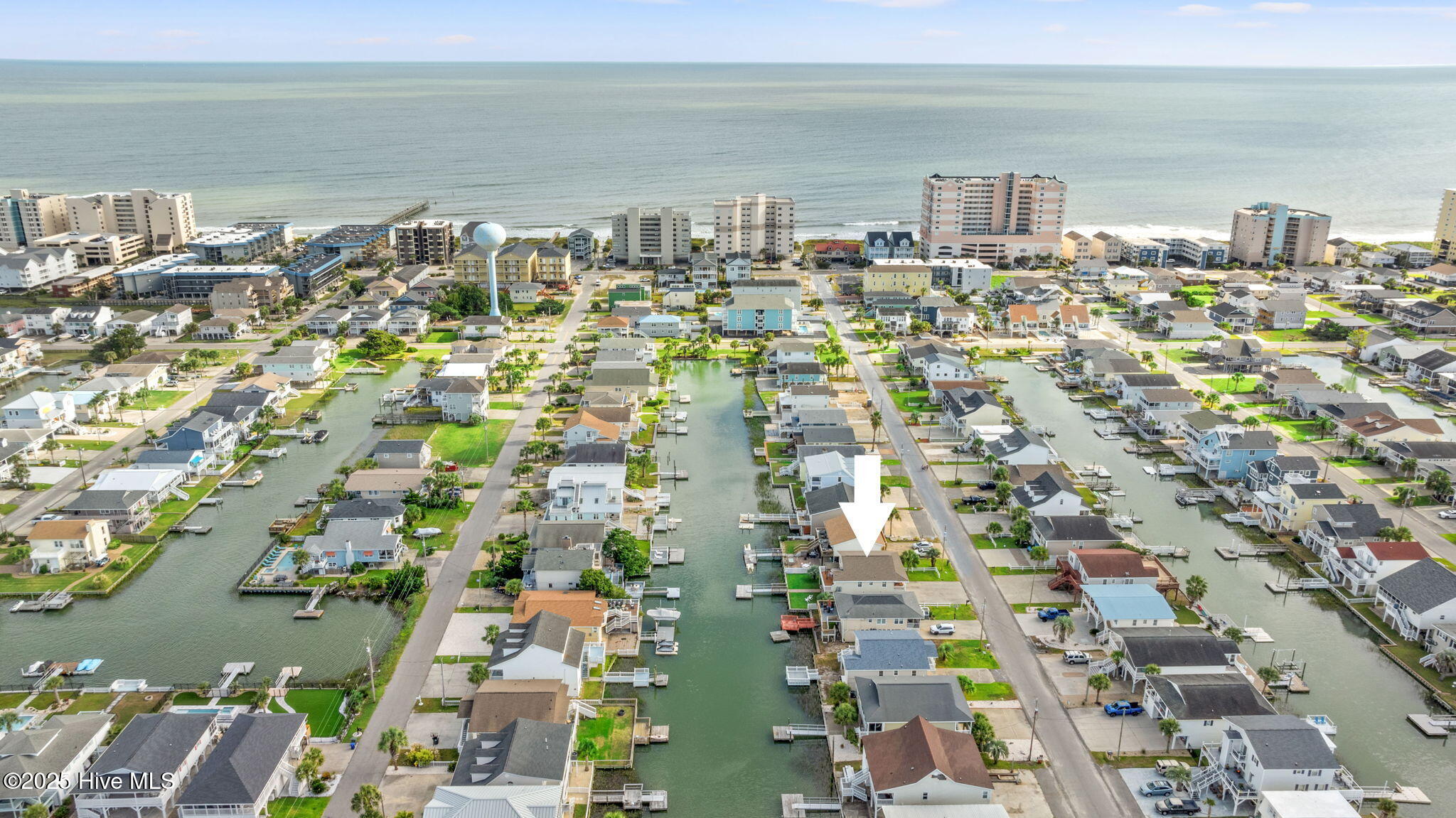Aerial view of canal location and walking distance to ocean