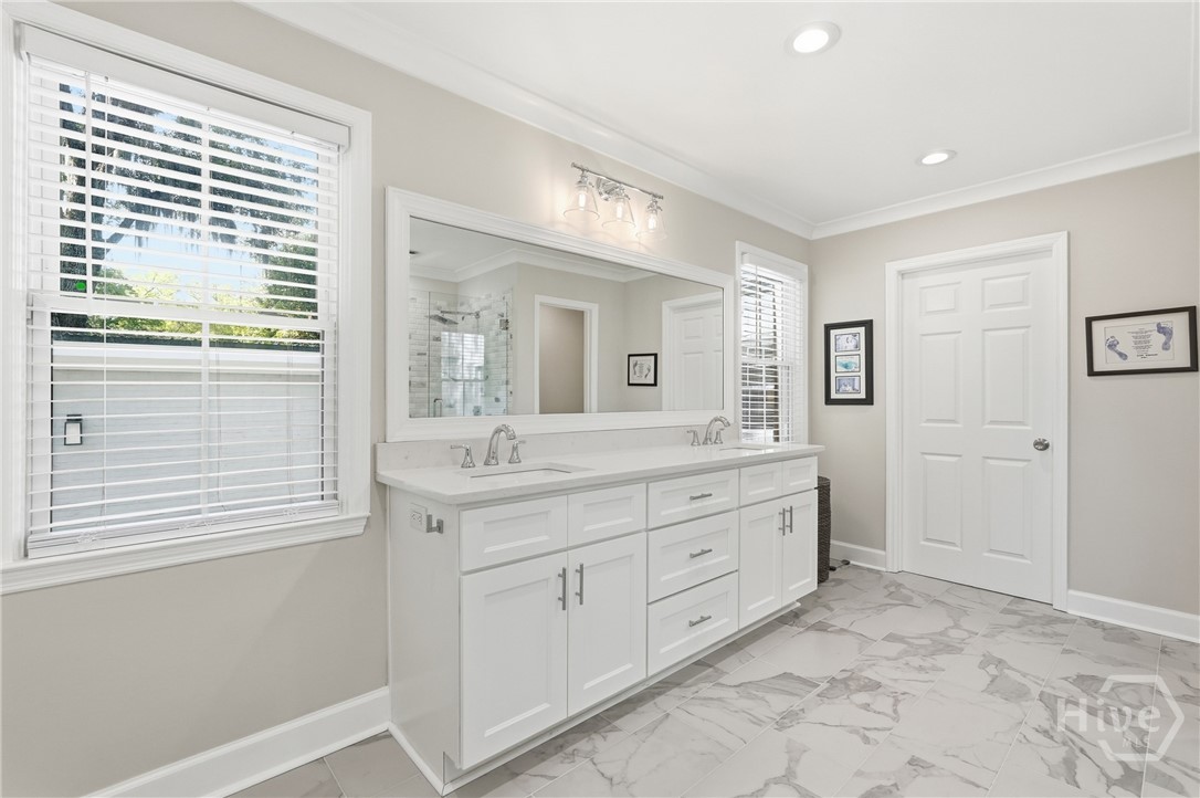 Dual vanity sinks in primary bathroom