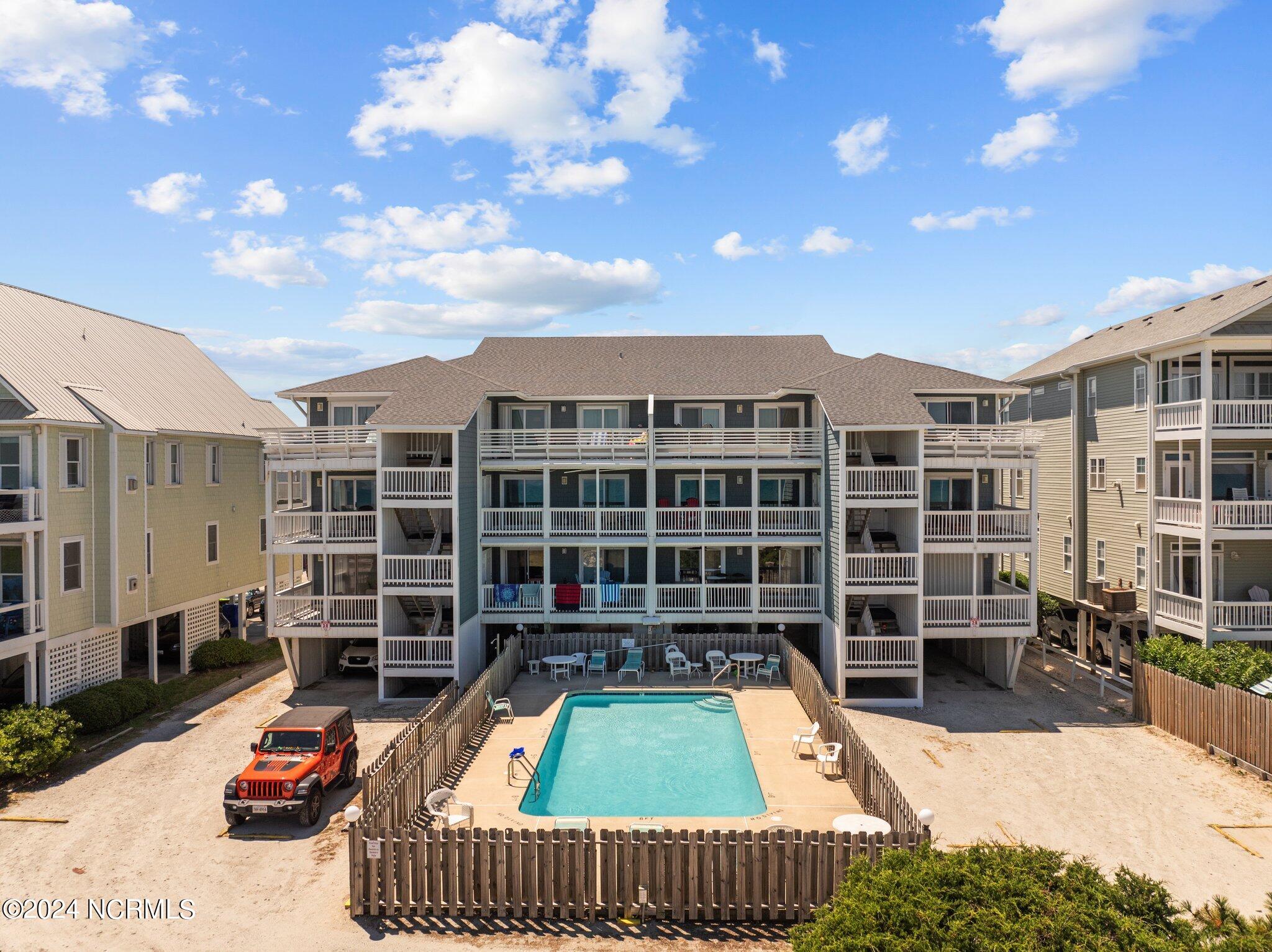1308 Carolina Beach Avenue N 3a, Carolina Beach, NC 28428 – photo 1 of 24: 2-web-or-mls-DJI_0382