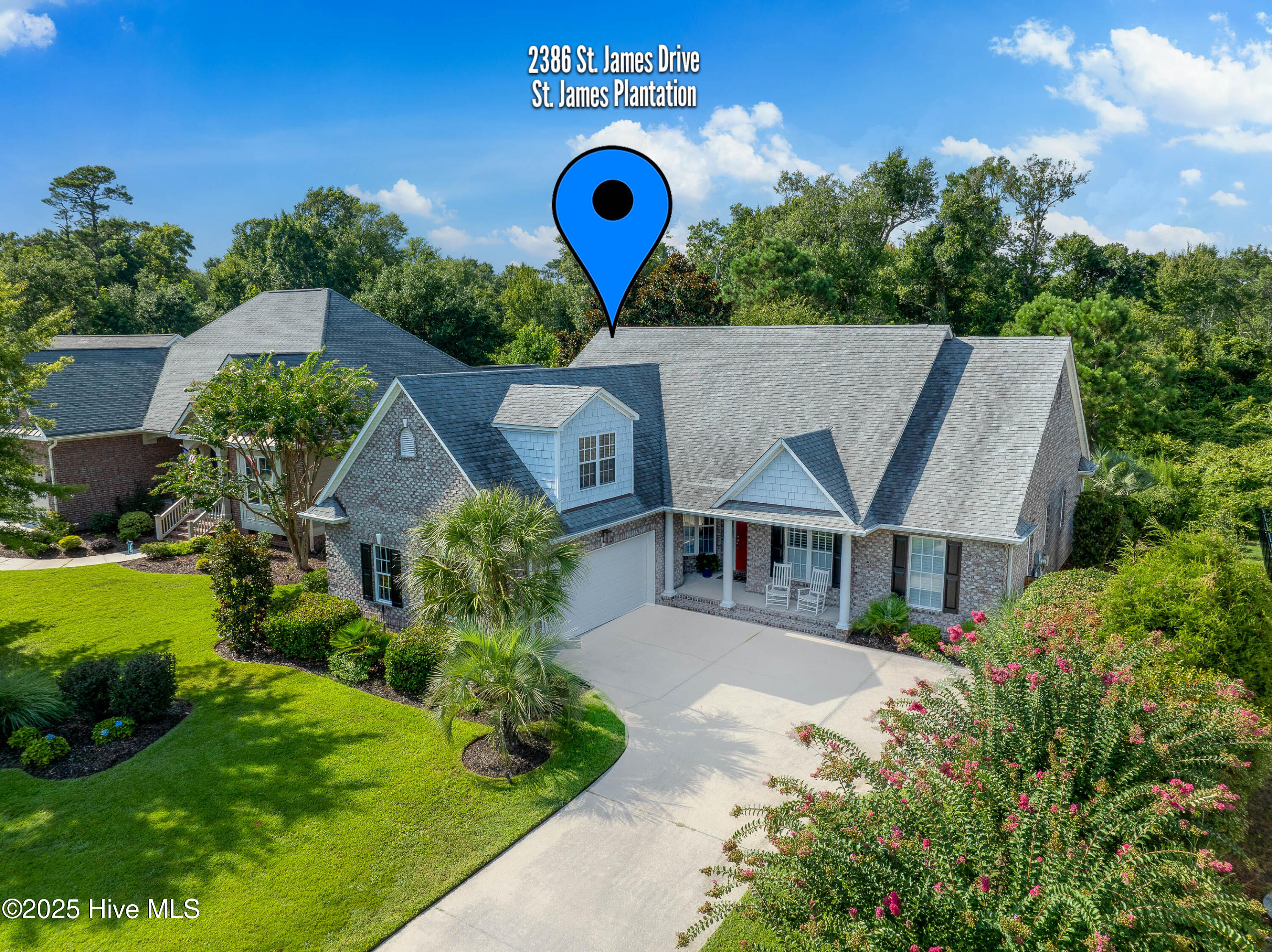 Coastal Casual Chic | Move Right In | Bright Open Pretty | Immaculate | Protected Bird Sanctuary in Back | Private Hot Tub and Outdoor Kitchen | 1 Minute to Grove Gate | Nestled in a quiet santuary and backed by a serene magnificent live oak trees, this beautifully crafted 2,509 sq ft home delivers the ultimate in coastal Carolina living. This popular Logan built Sanderling plan offers thoughtful design, elegant finishes, and seamless indoor-outdoor living. With 3 spacious bedrooms and a layout designed for comfort and flow, this home is ideal for both relaxing and entertaining. Natural light fills the open-concept living space, highlighting the quality craftsmanship and attention to detail throughout. Step outside to a tranquil backyard sanctuary — the perfect setting for morning coffee, peaceful evenings, or hosting guests under the canopy of ancient oaks. Located in the sought-after gated community of St. James Plantation, this home offers unmatched access to top-tier amenities. Enjoy walkability to the marina, where you'll find waterfront dining and stunning views. The community boasts 81 holes of championship golf, five restaurants, three fully equipped fitness centers, and a nationally recognized tennis program. Whether you prefer pickleball, a swim at the pool, or a quiet bike ride along tree-lined streets, St. James offers a vibrant, active lifestyle. This property is more than a home — it's a retreat in one of North Carolina's premier coastal communities. A rare opportunity to enjoy privacy, natural beauty, and resort-style amenities all in one place.