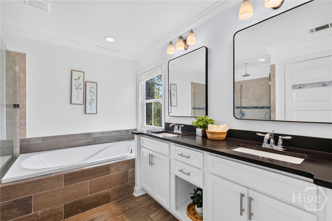 primary bath has double vanities