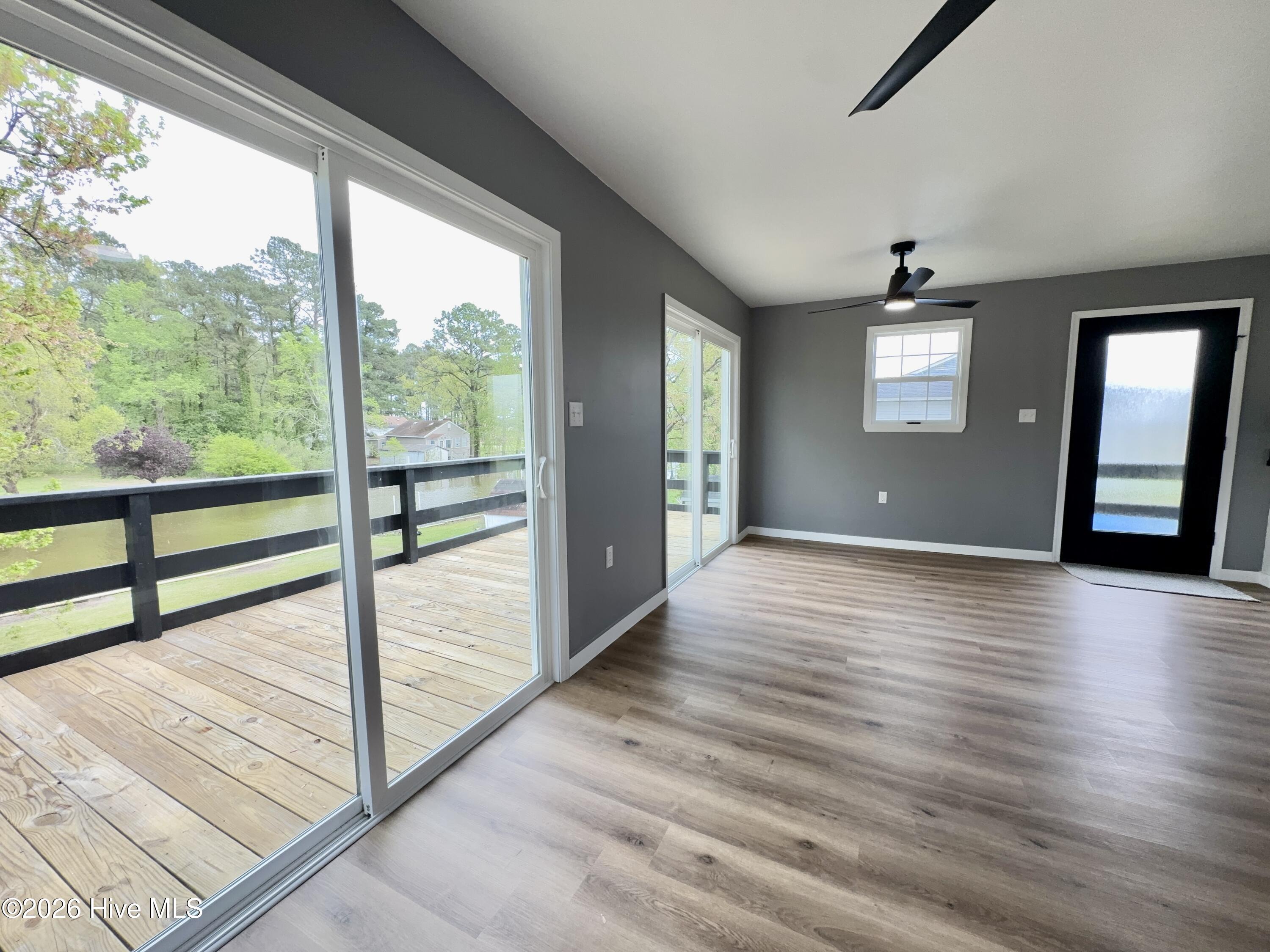 spacious living area with water views
