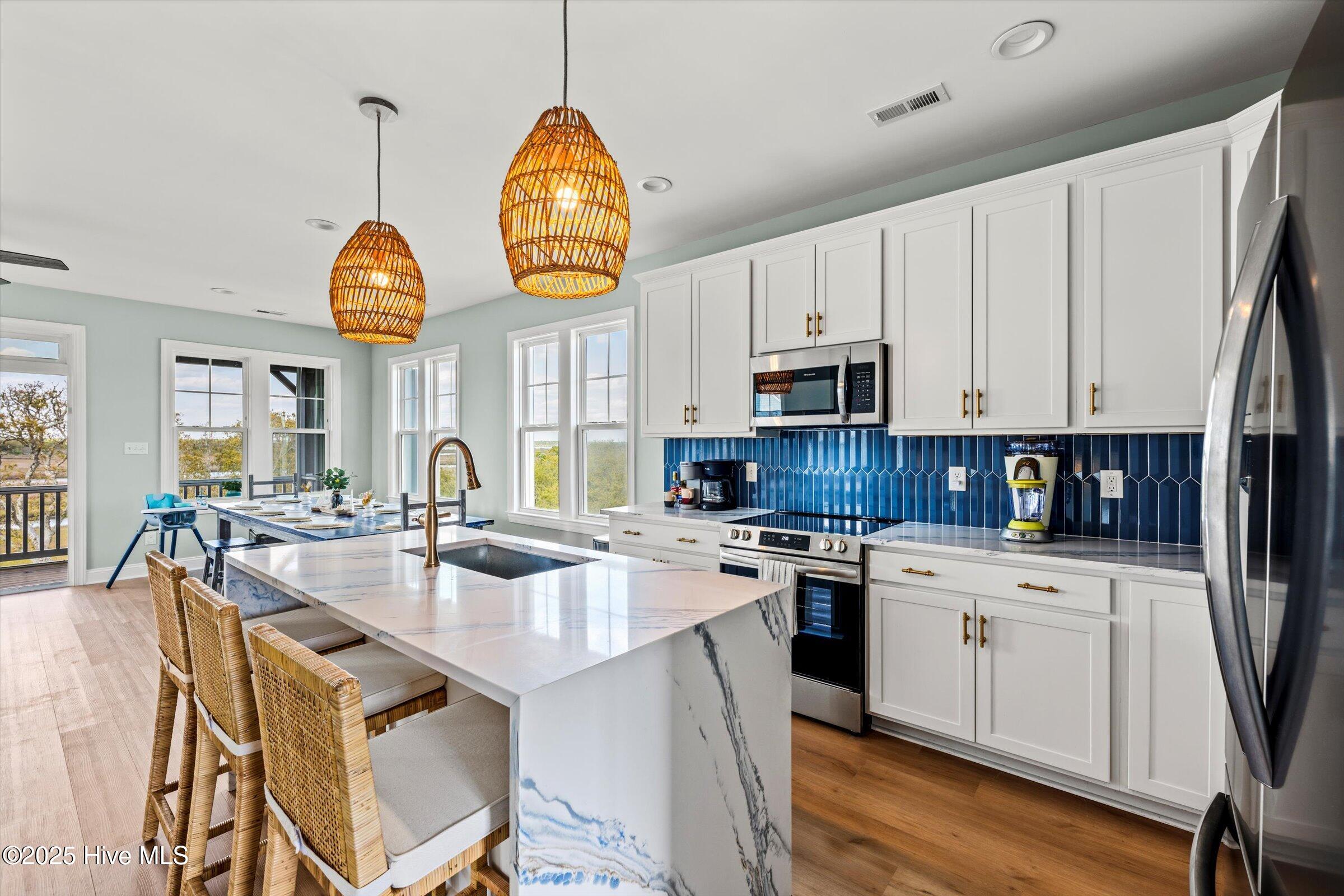 1007 N New River Drive, Surf City, NC 28445 – photo 10: 088-Z8C_3547