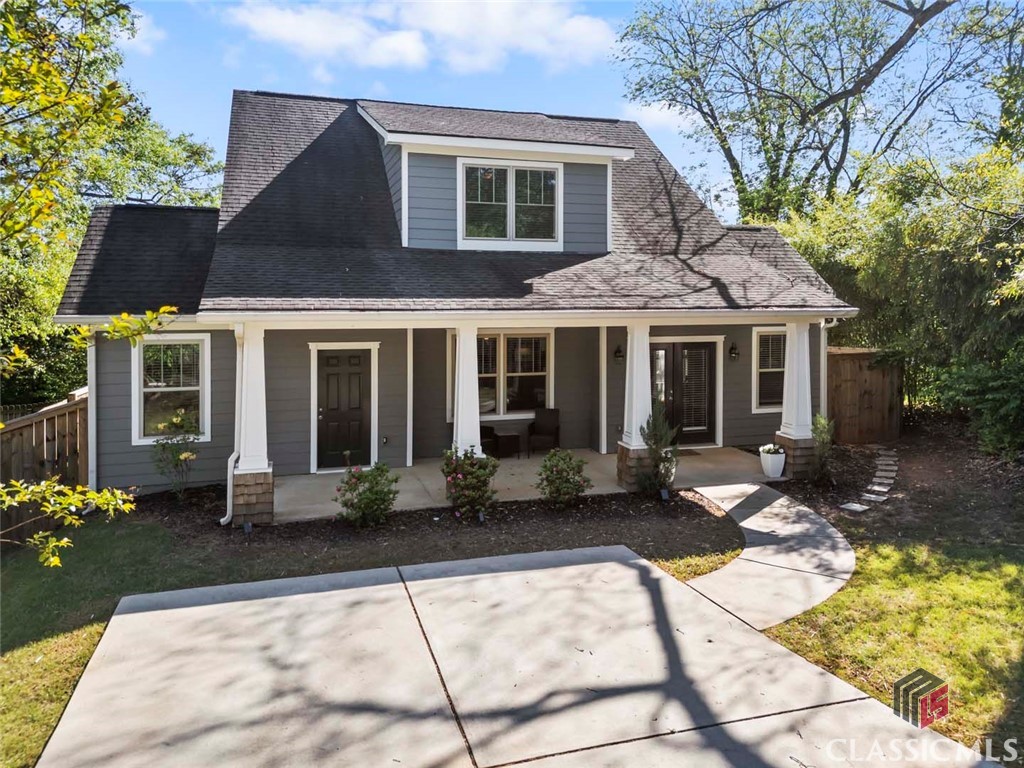 Don't miss this absolutely adorable and well-maintained bungalow in Normaltown/ General Hospital area! Tucked away on a fenced lot and sited above street level, the setting feels very private. Recent upgrades include fresh exterior paint, new carpeting in bedrooms, new privacy fencing, and more! The home's layout is an open concept featuring a Greatroom with hardwood flooring, fireplace and vaulted ceiling, a dining room, and a bright, cheery kitchen with stainless steel appliances and center island. Spend your evenings on the screened front porch overlooking the yard. There is plenty of afternoon sun to spur on a vegetable garden in the yard if desired. Owner's Suite is located on the main level and features beadboard ceilings, a very spacious ensuite bathroom with double vanity, soaking tub, tiled shower, and walk-in closet. Upstairs are two additional bedrooms that share a nicely finished hall bathroom. This home is only ten years old and has been well cared for! Located a stone's throw to St. Mary's & Piedmont Hospitals as well as Downtown Athens & Normaltown!